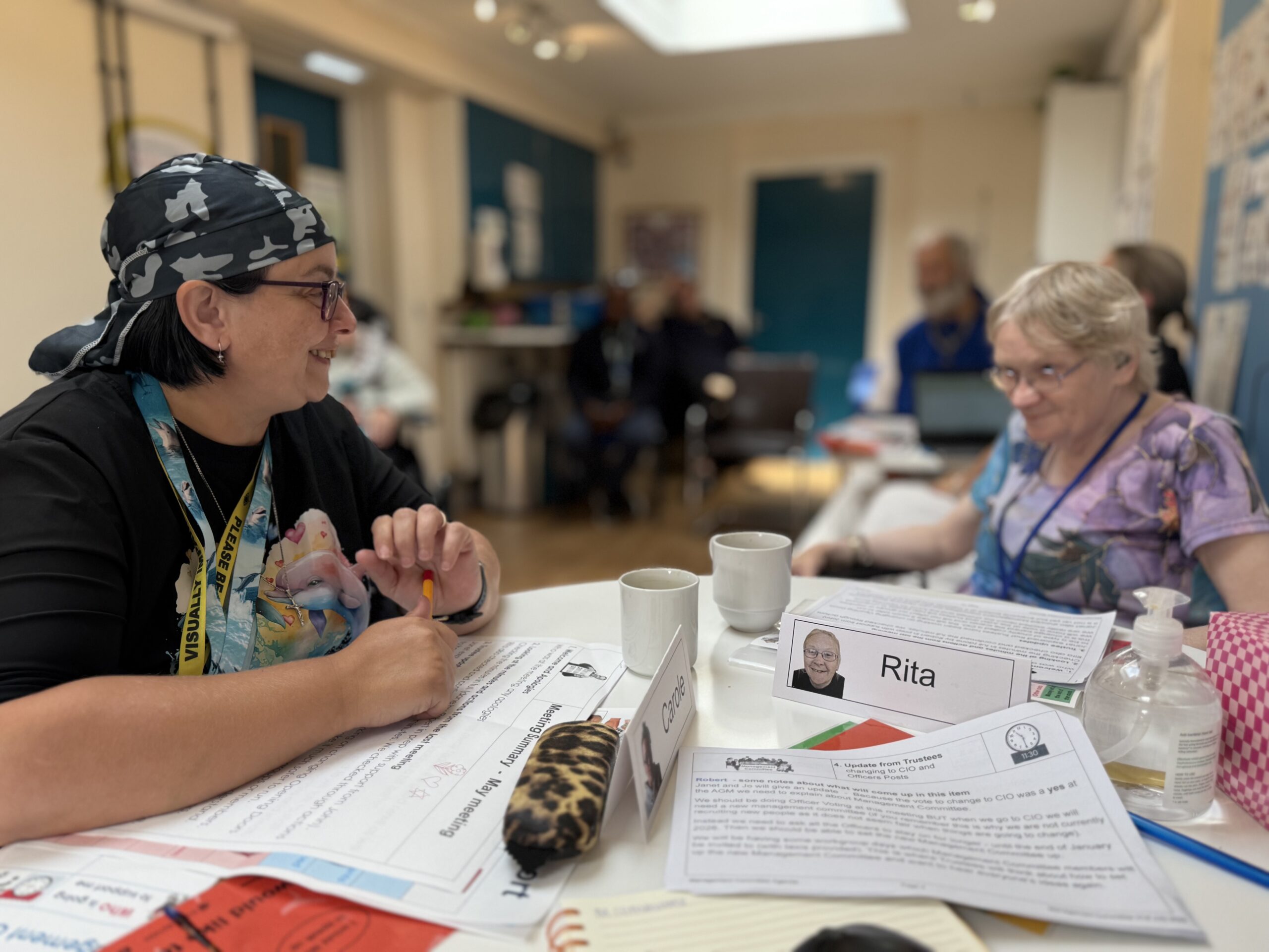 2 people working together