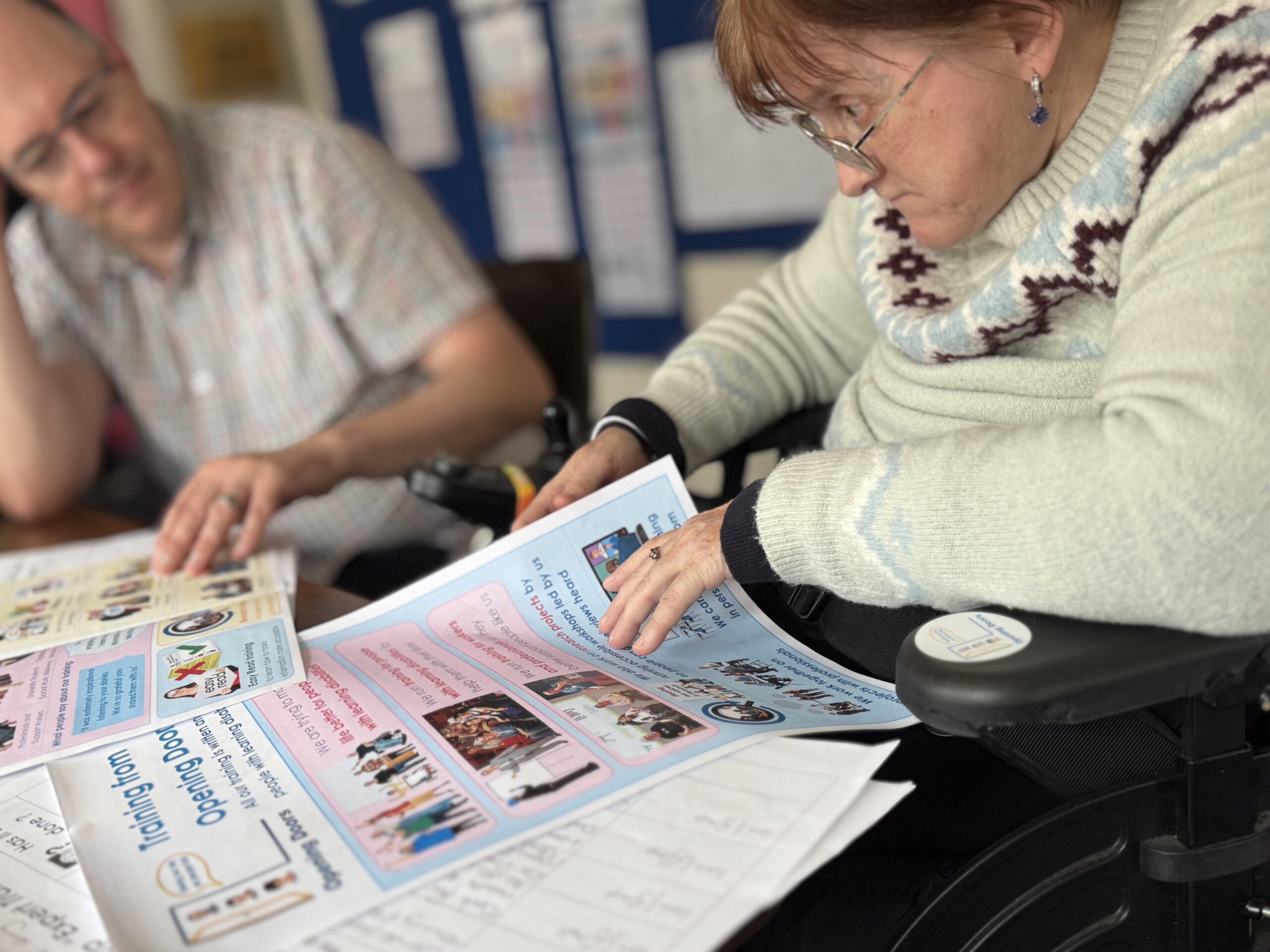 Adviser supporting advocate with Easy Read